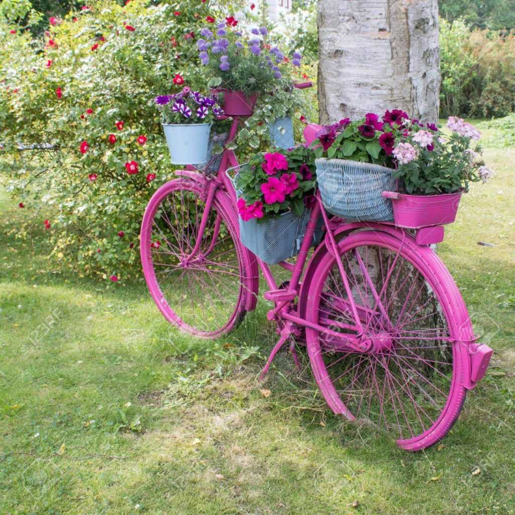 20 свежих идей для использования старого велосипеда в дизайне сада